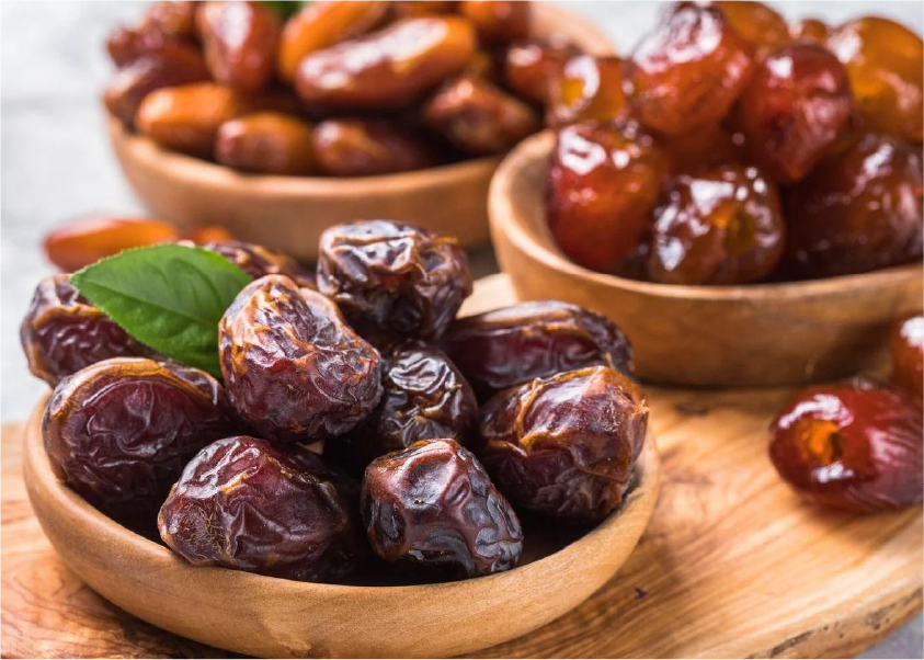 Fresh dates on palm tree